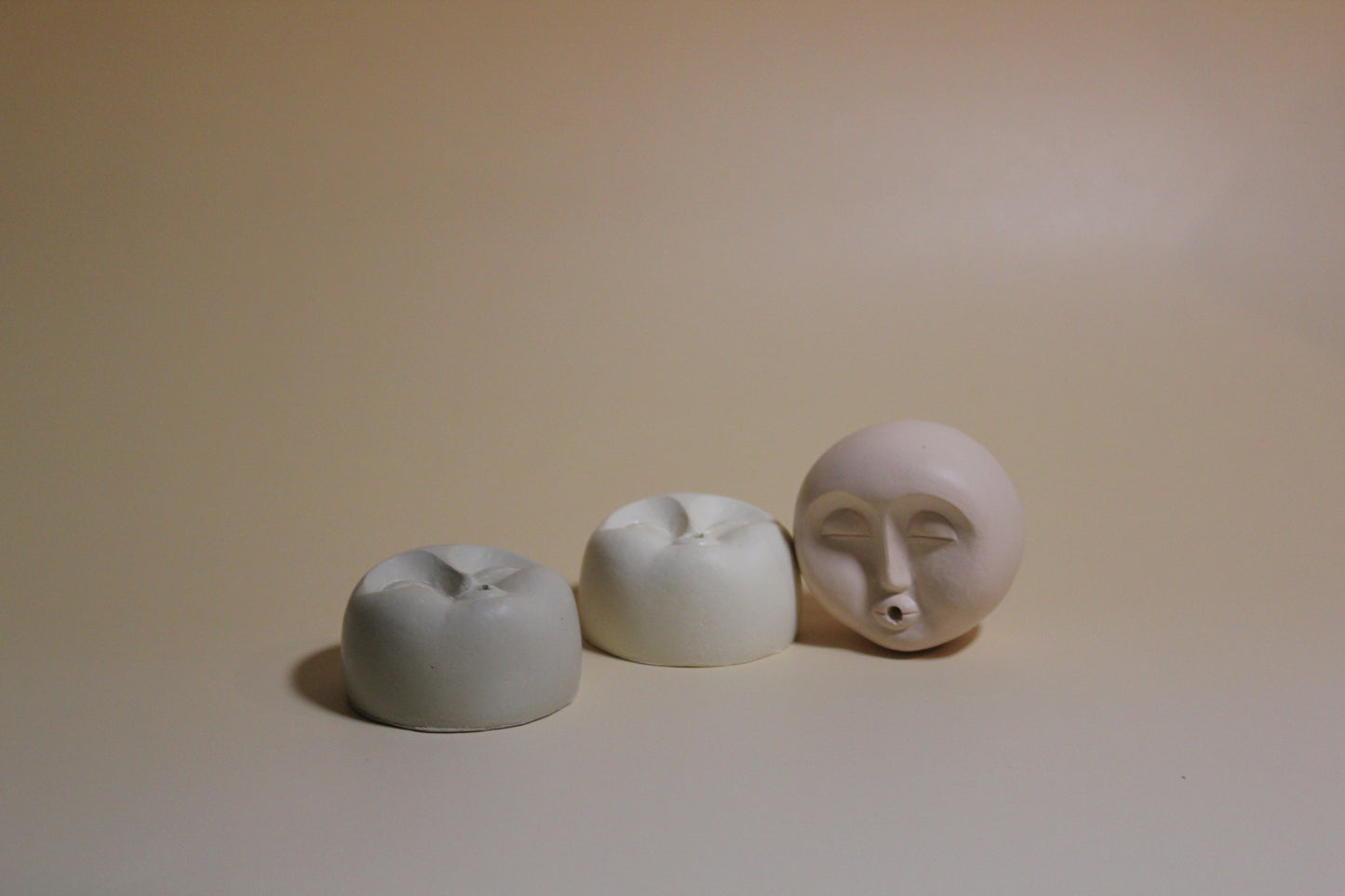 Incense holder: FACES